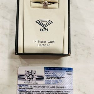 I am selling a 1 carat diamond ring. The ring is 14 karat white gold. Size: 5.5